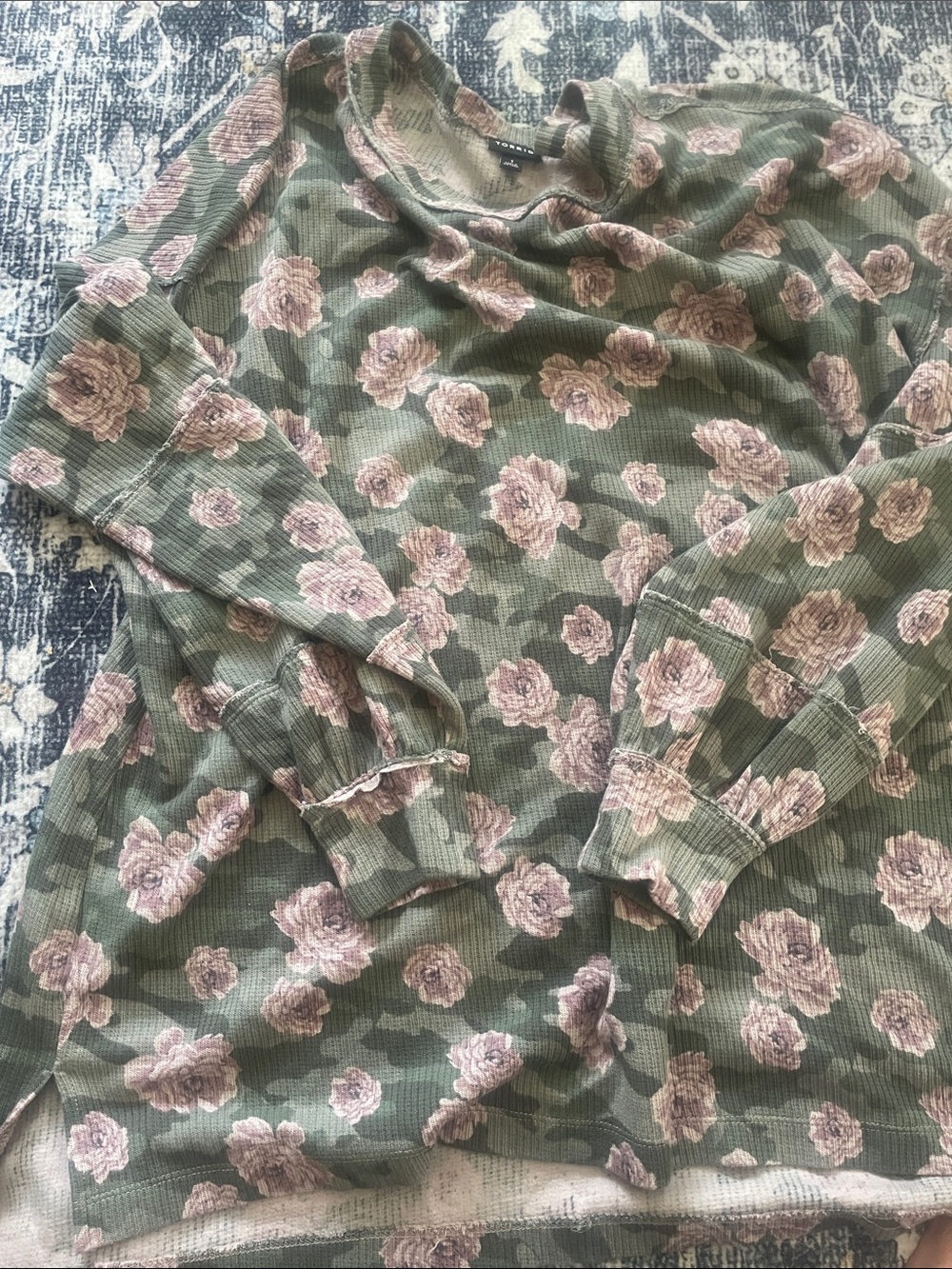 Torrid camo with floral top.